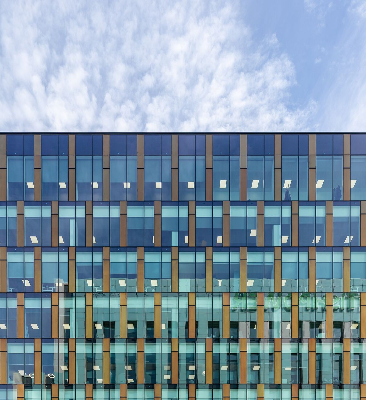 Contemporary glass and copper-clad commercial office building